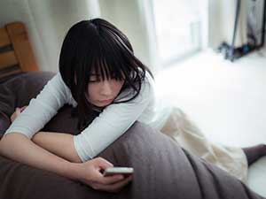 疲れていそうな女性